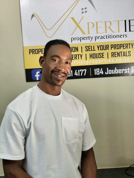JULIUS  MEJELWA, estate agent